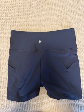 Athleta Navy High-Rise Bike Shorts with Side Pockets